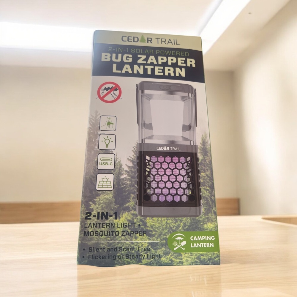 NEW in box Solar powered camping lantern with bug zapper. 60 lumen lantern